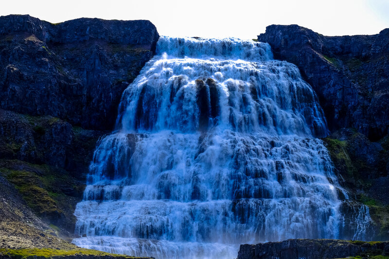 Powerful waterfall cascading down cliffs