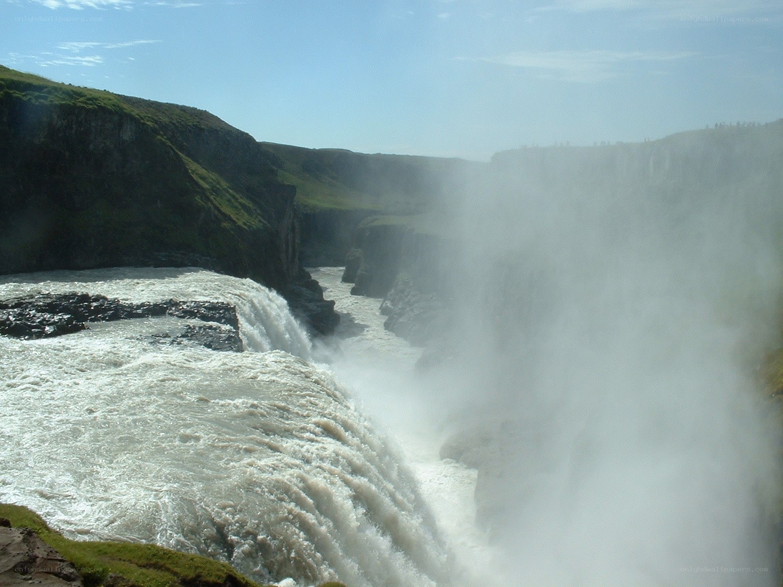 powerful waterfall in a canyon