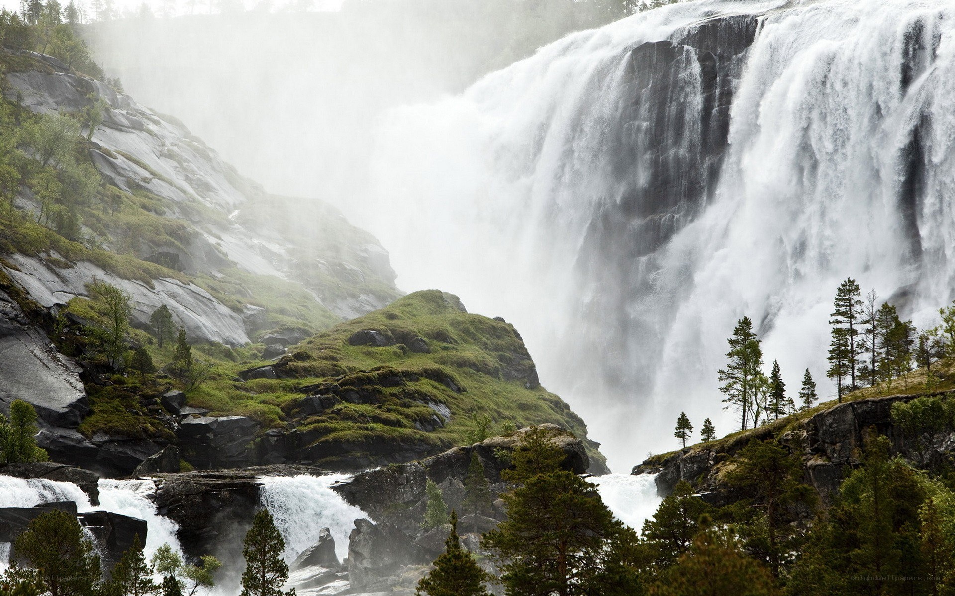 powerful waterfall in a forest