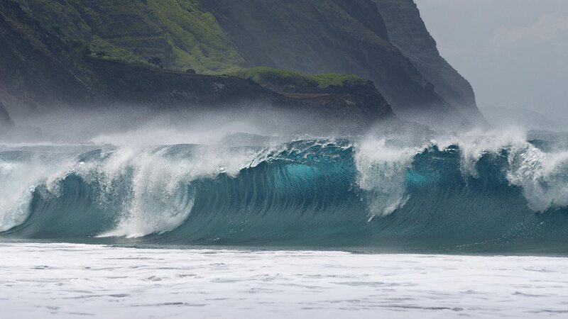 powerful wave crashing on coast