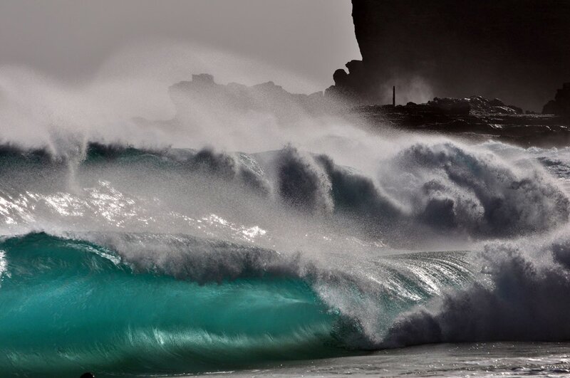 Powerful waves crashing on rocks