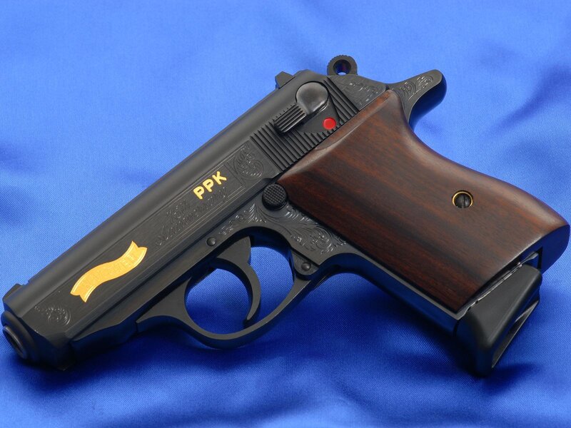 PPK pistol with wood grip