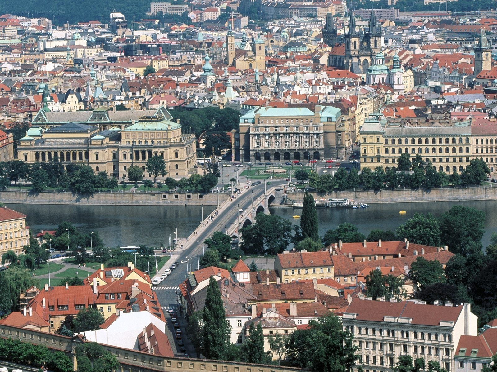 Prague cityscape with river and bridge