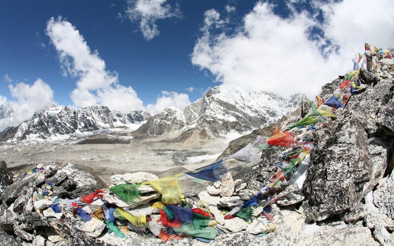 Prayer flags on a mountain peak