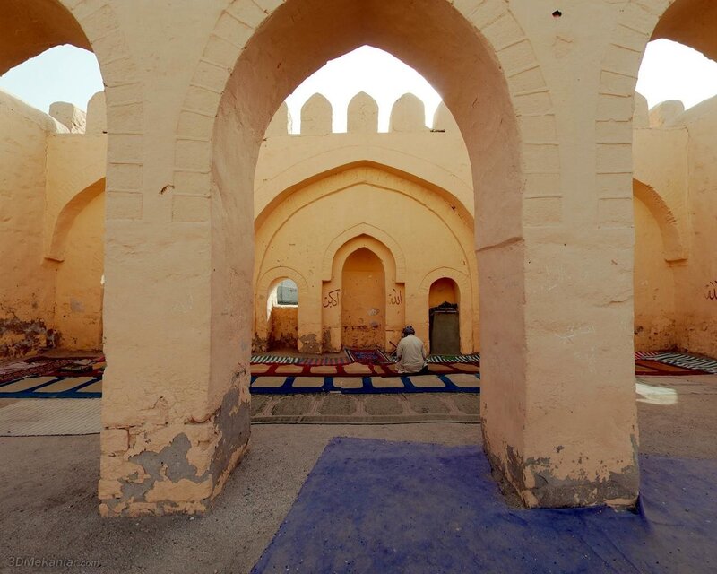 Prayer in a historic mosque