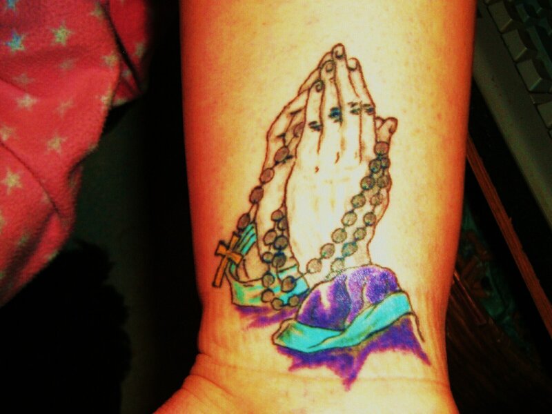 praying hands tattoo