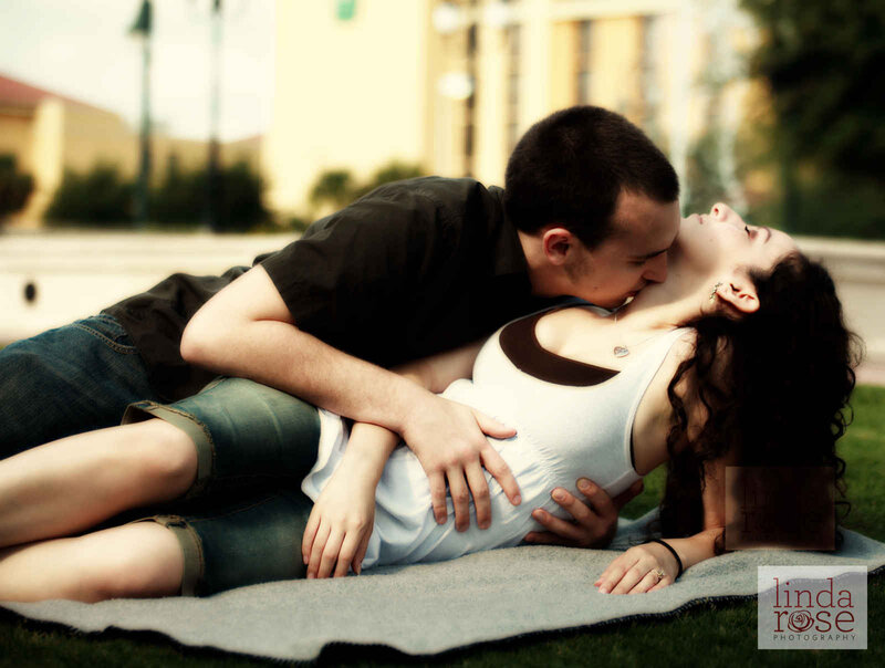 Pregnant Couple Kissing