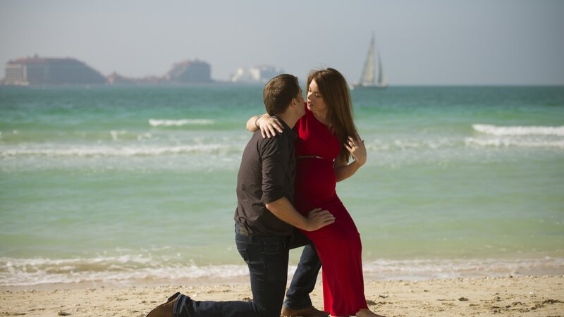 Pregnant Woman and Man — Red