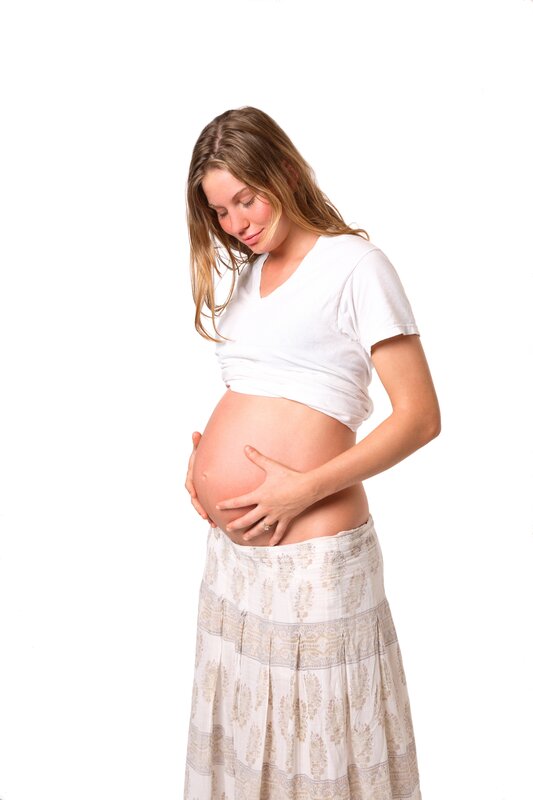 pregnant woman holding belly