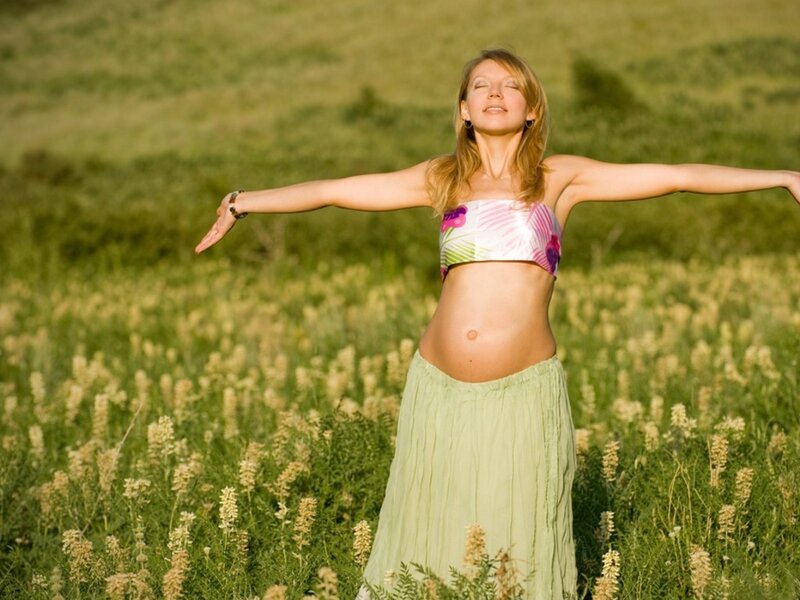 Pregnant Woman in Field