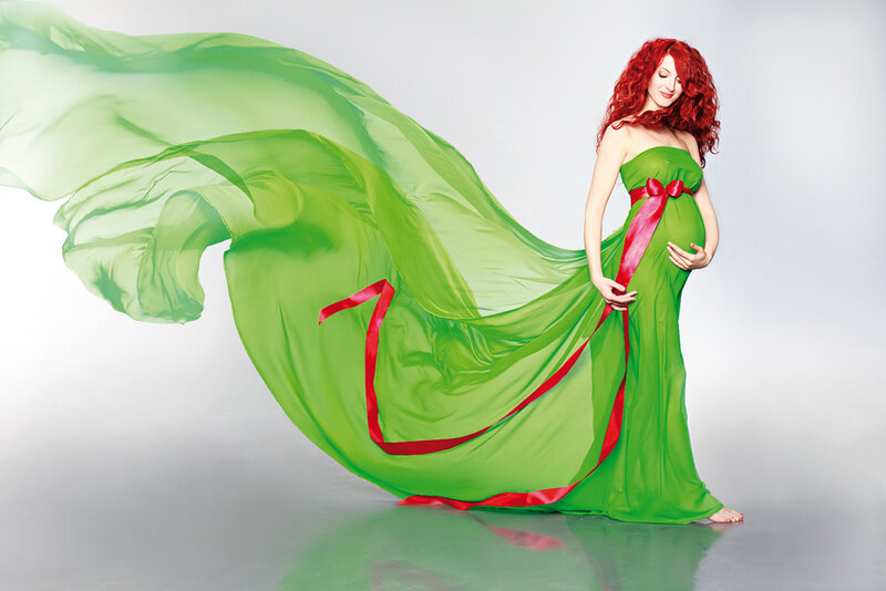 Pregnant woman in green dress