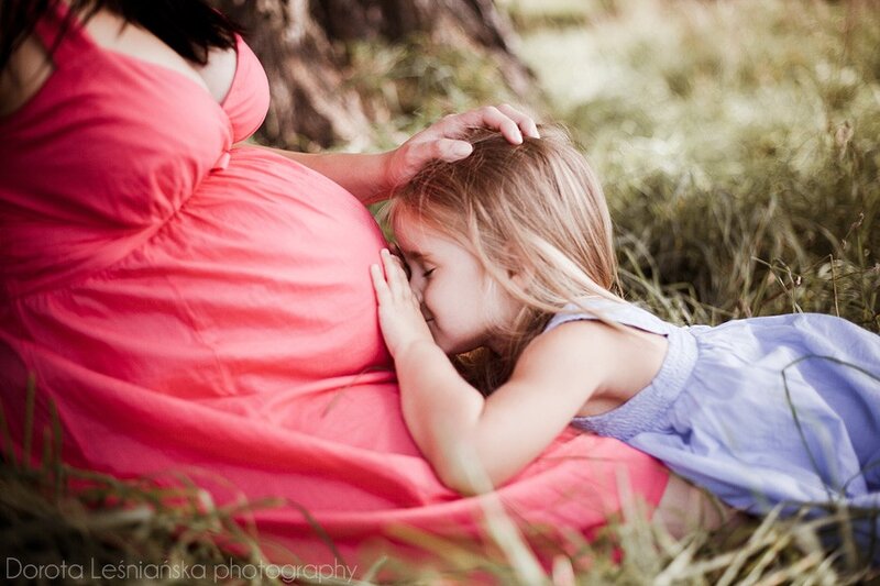 pregnant woman with child