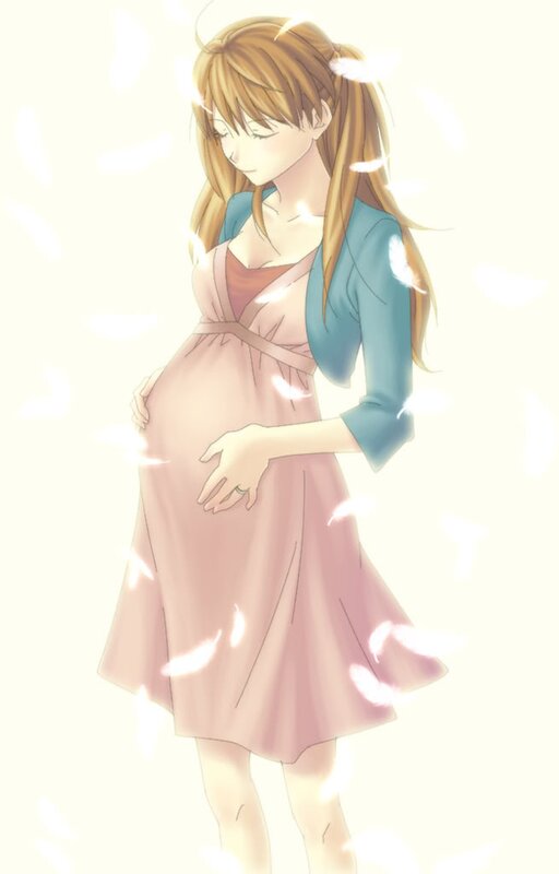 pregnant woman with feathers