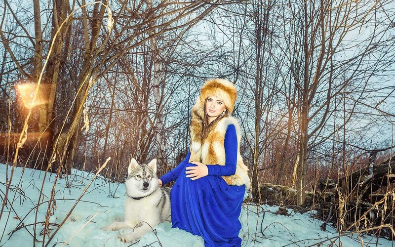 Pregnant Woman with Husky