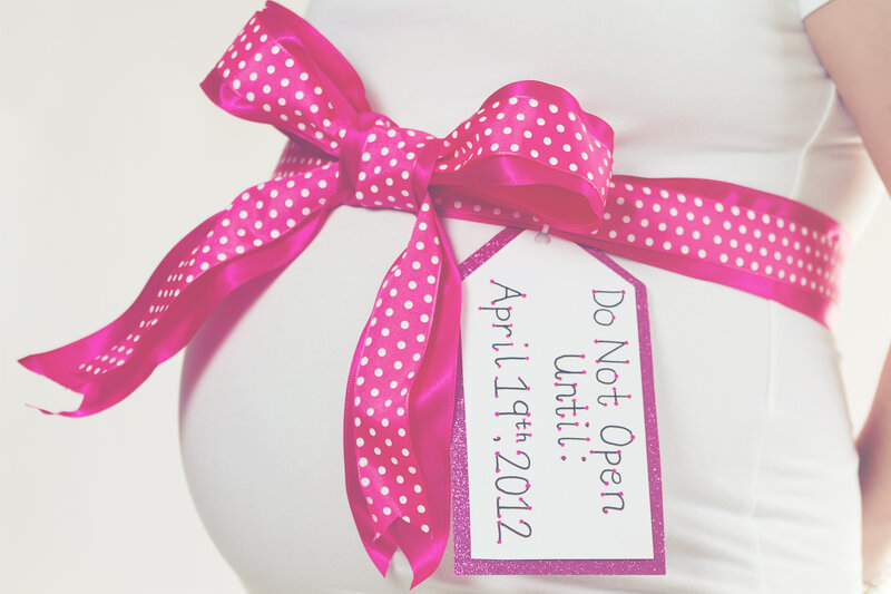 Pregnant Woman with Ribbon
