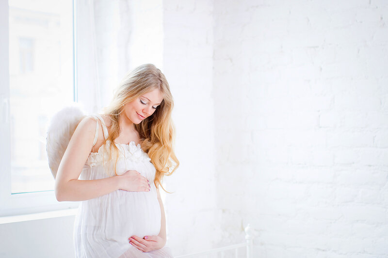 Pregnant Woman with Wings