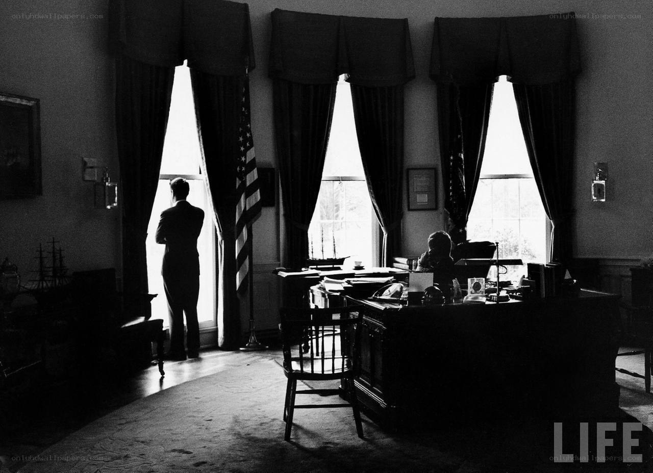 President at the Oval Office window