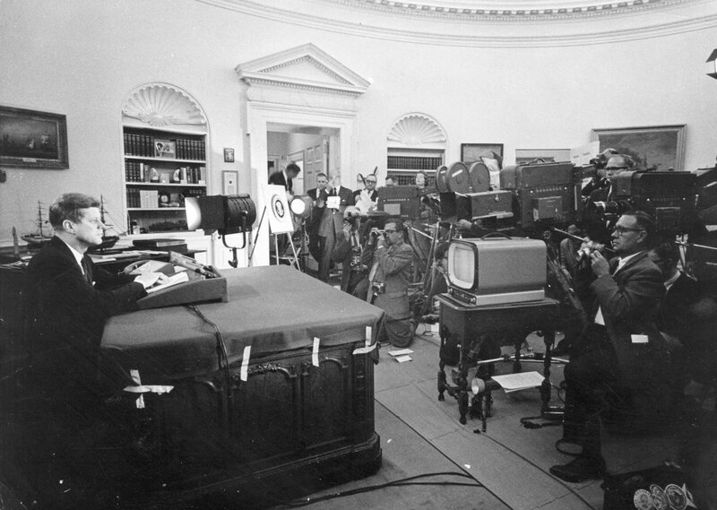 President Kennedy at desk