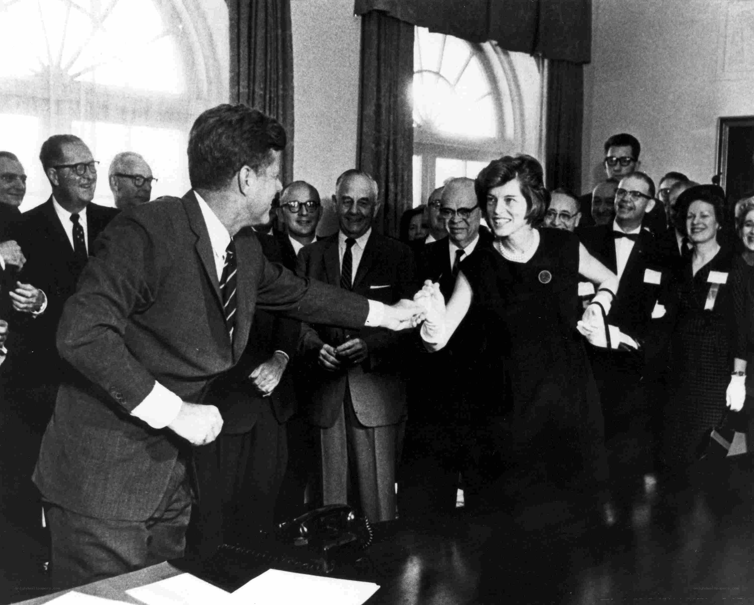 President Kennedy shaking hands