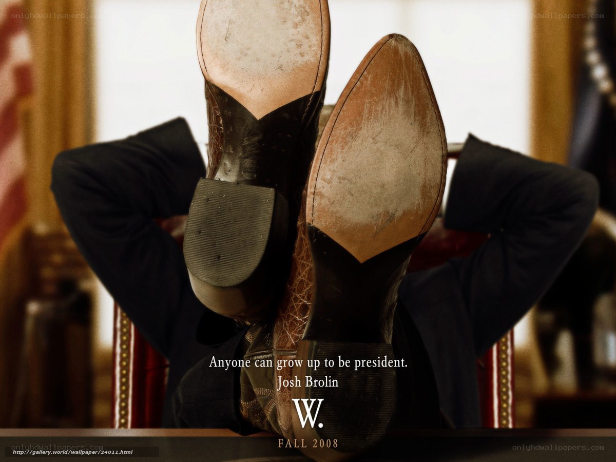 president's boots on desk