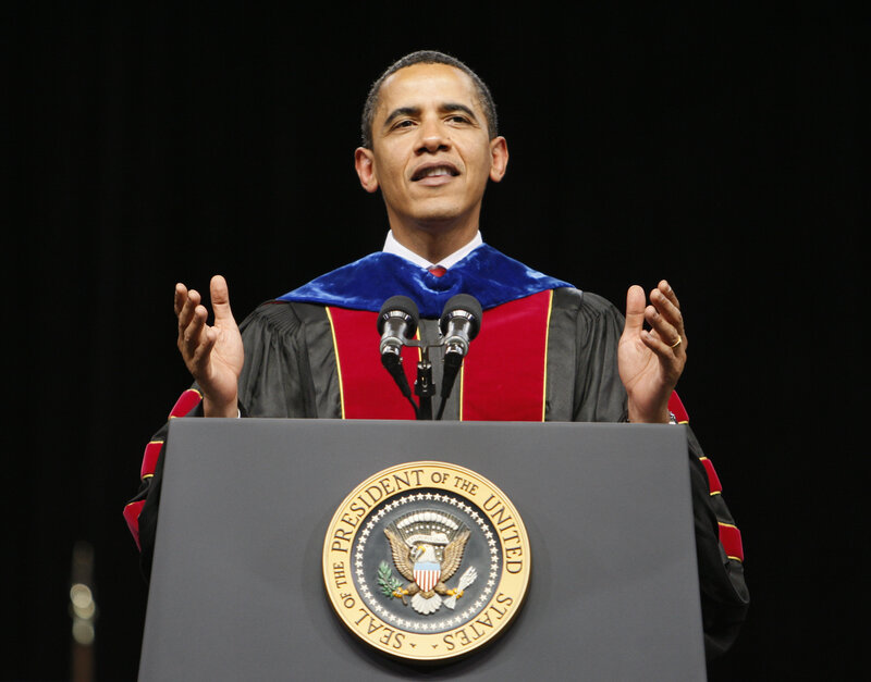 President Speaking at Podium — Black