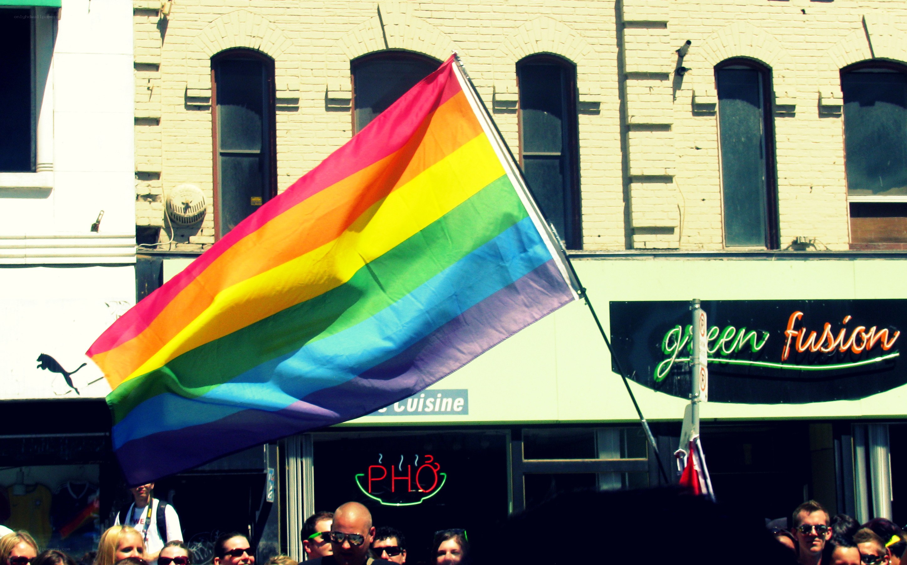 Pride flag at a street parade