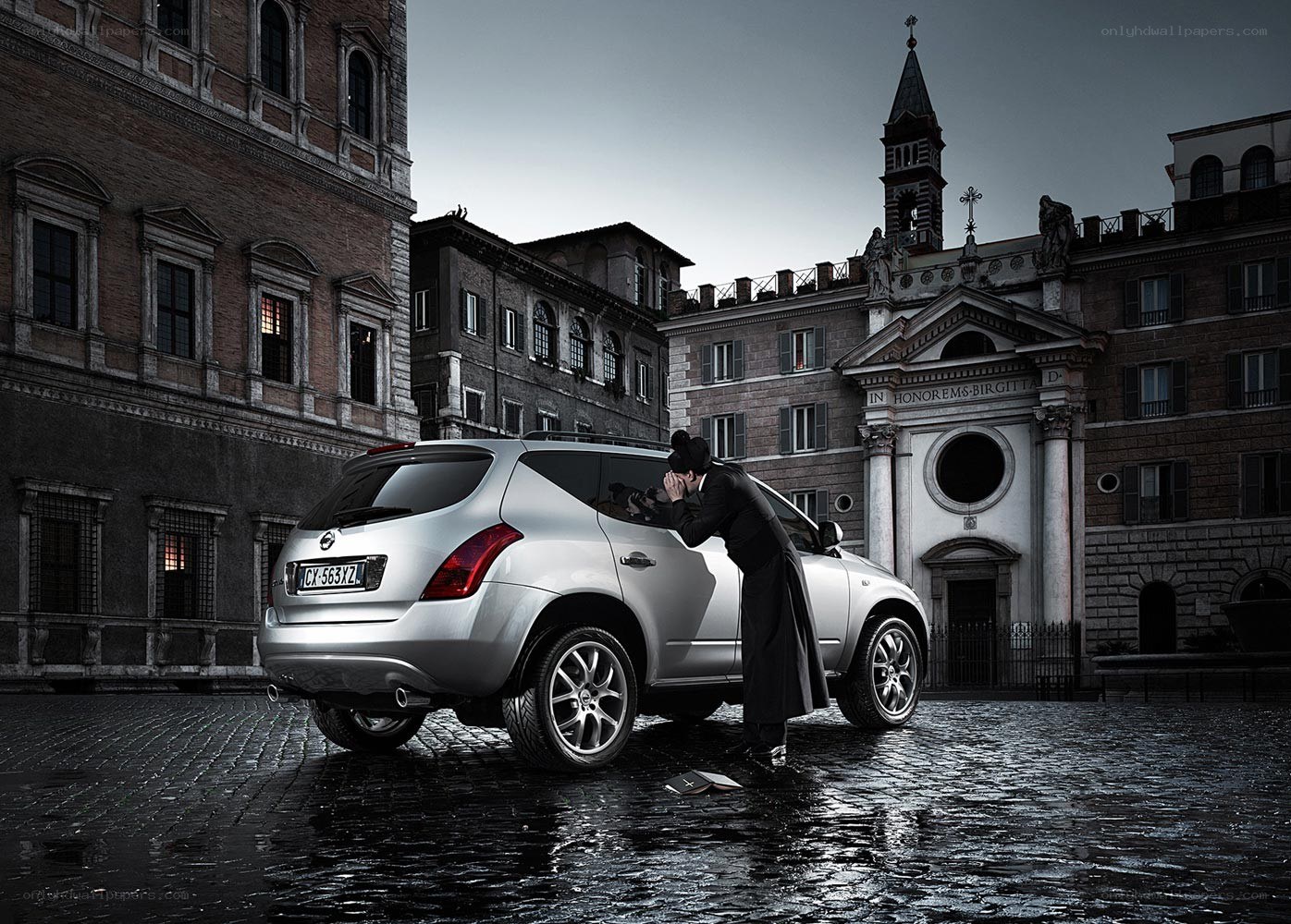 Priest by a silver car