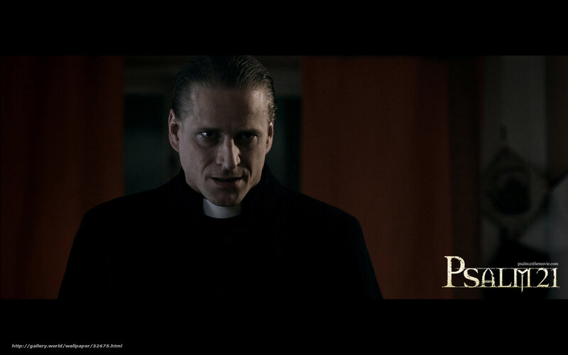 Priest in dark room