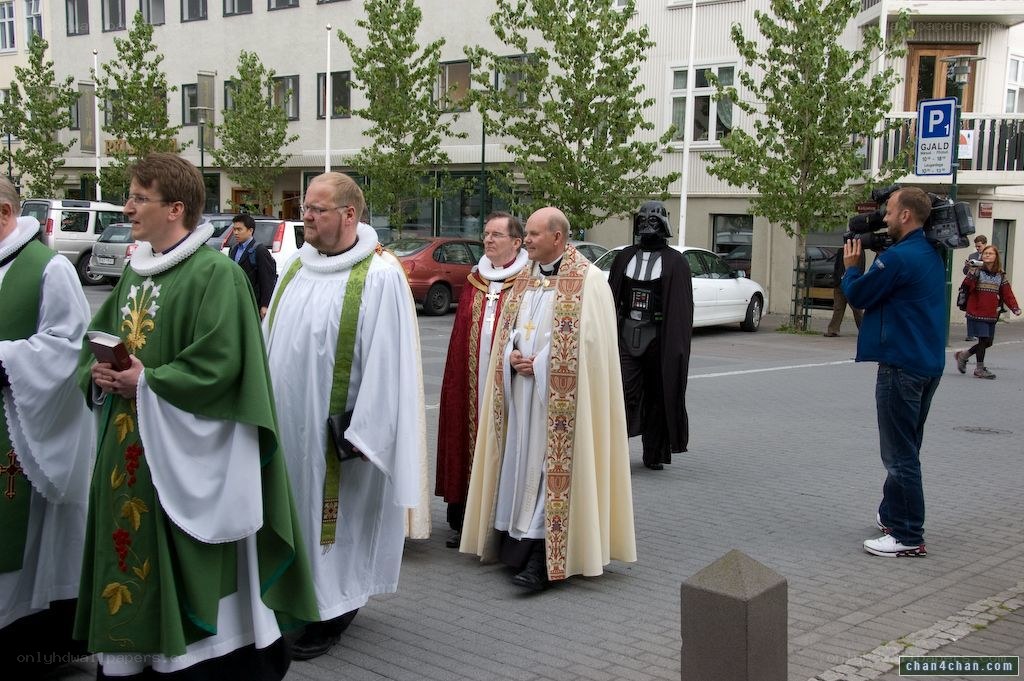 Priests and Darth Vader in parade