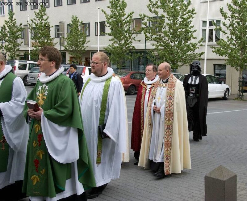 Priests marching with Darth Vader