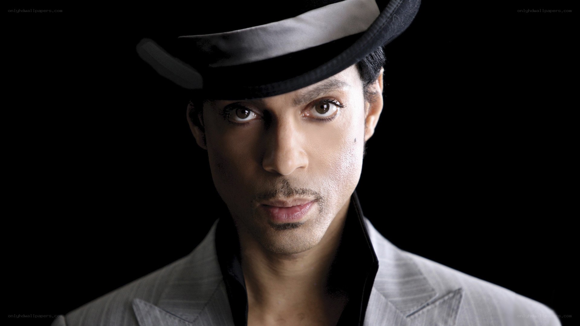 Prince in a hat and suit