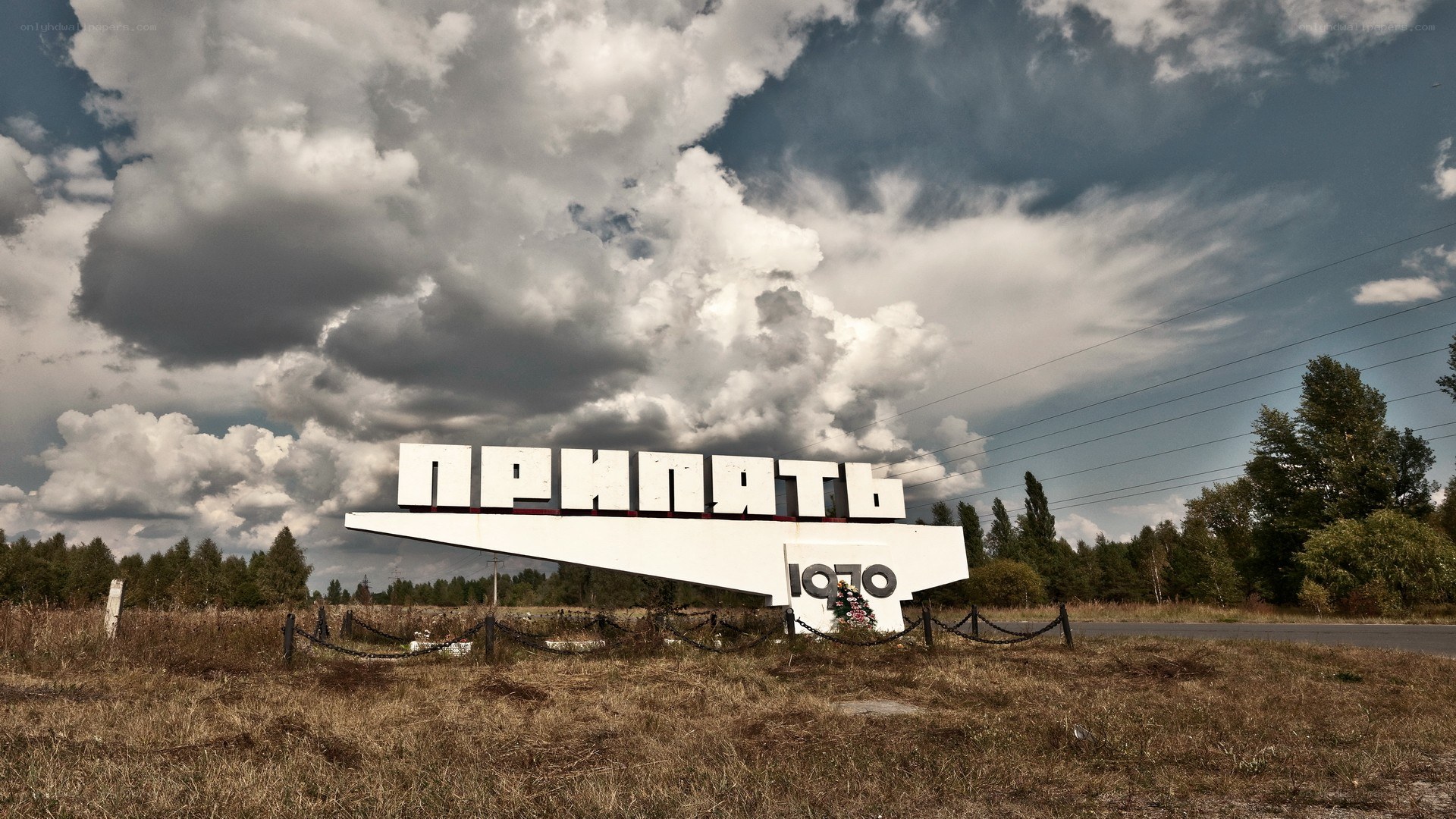 Pripyat sign under cloudy sky