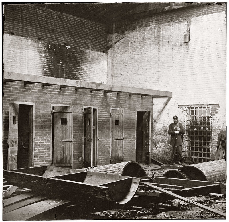 Prison interior with guard