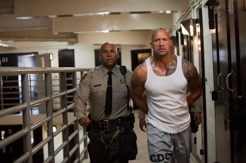 prisoner escorted by guard