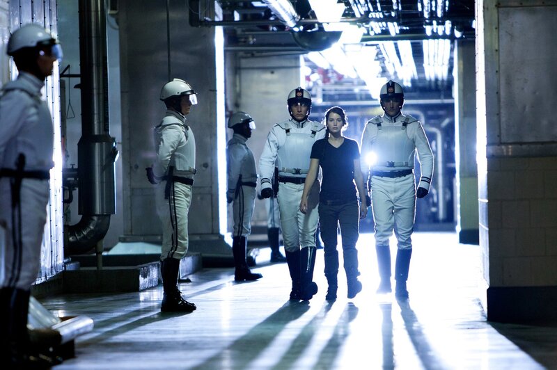 Prisoners escorting a woman