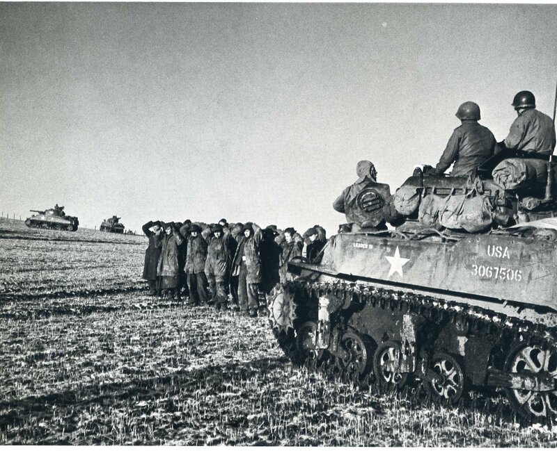 Prisoners with American tanks