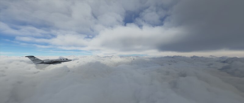 Private Jet Above Clouds