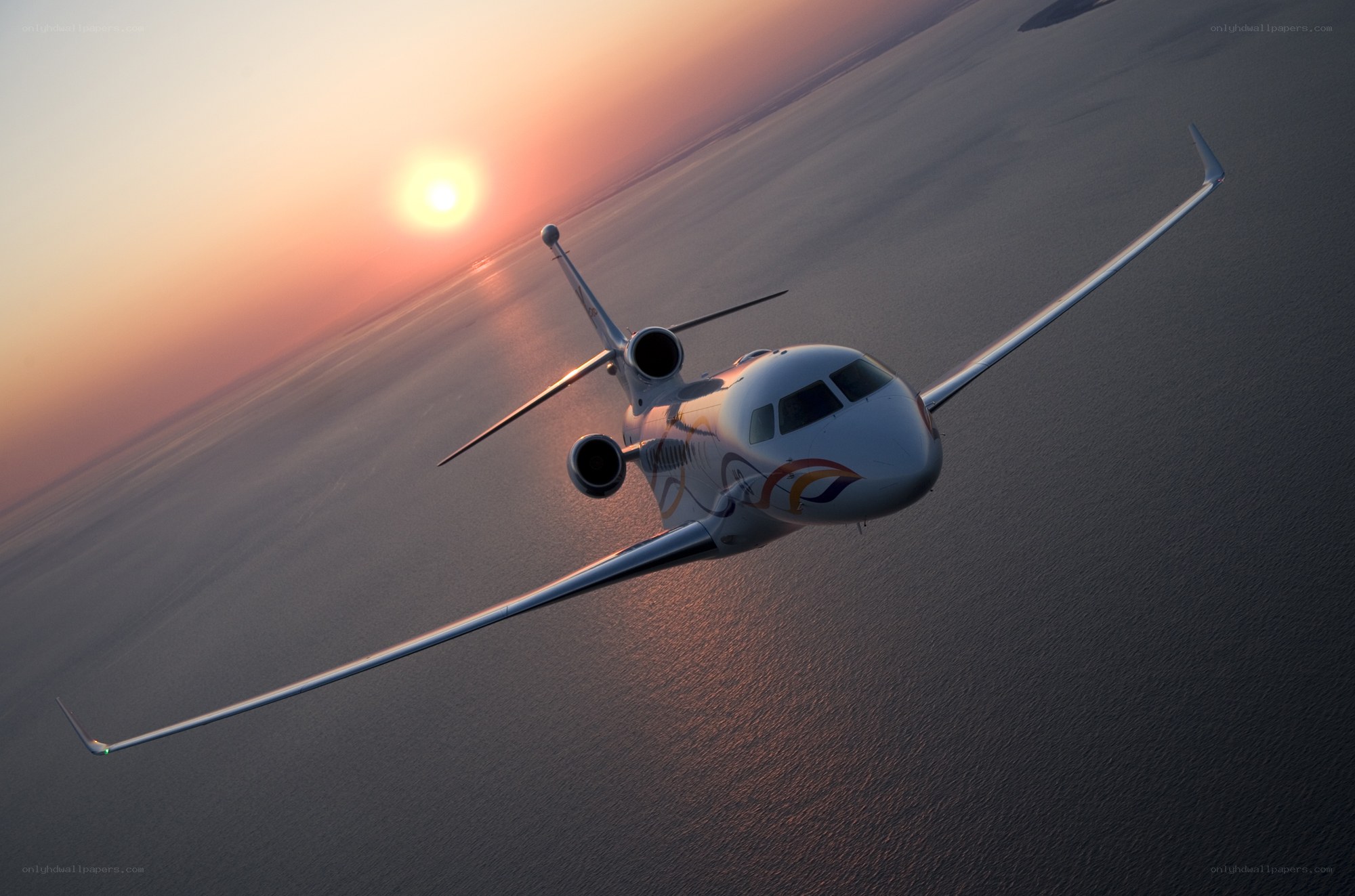 private jet at sunset