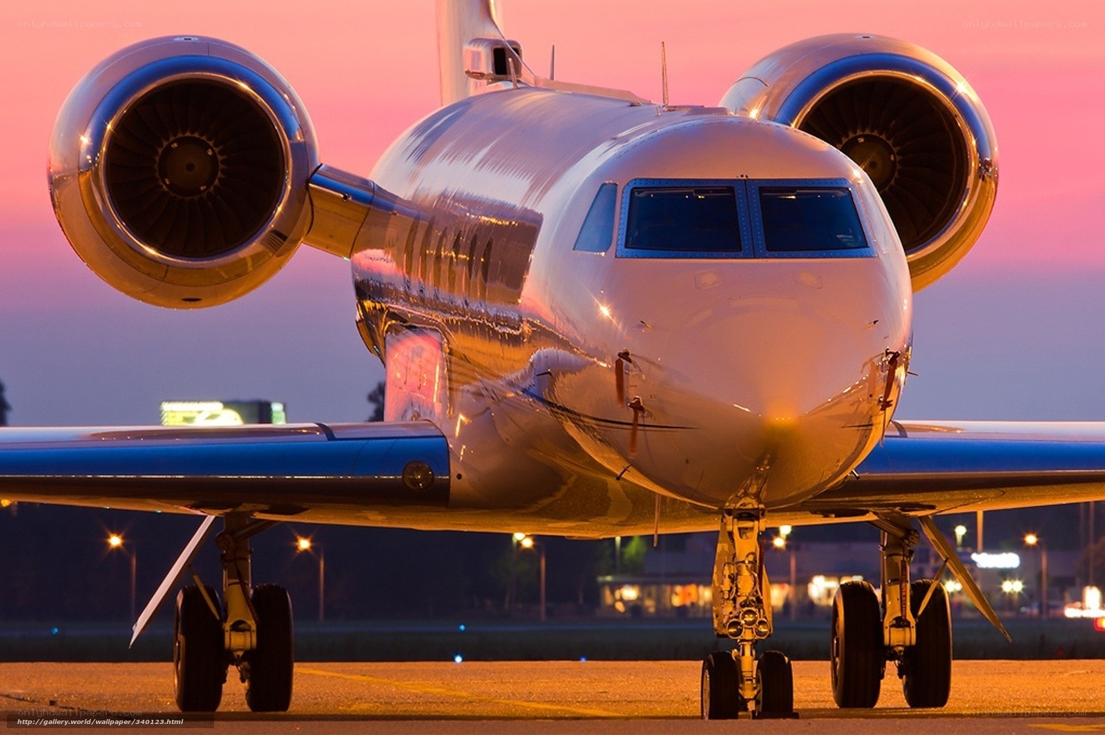 Private jet at sunset