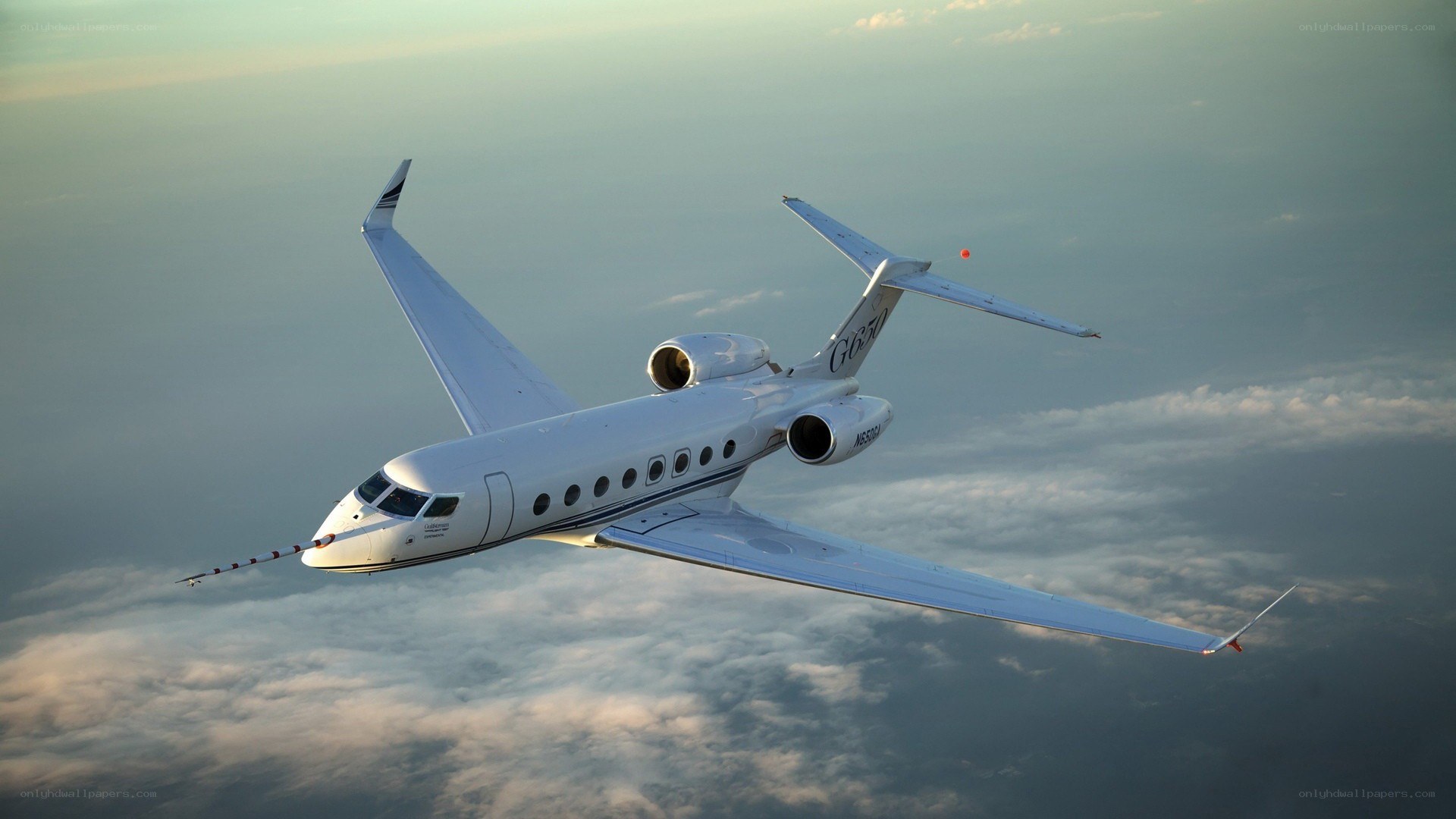 private jet flying above clouds