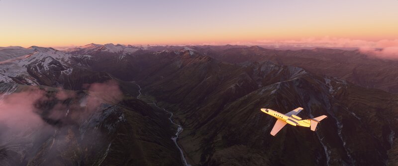 Private Jet Flying over Mountains — Orange
