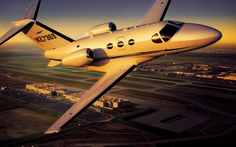 Private Jet in Flight — Gold, Dramatic, Sunset, Photograph