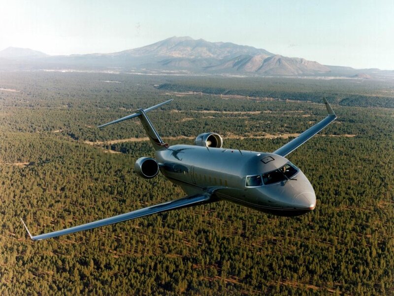 Private Jet in Flight — Green