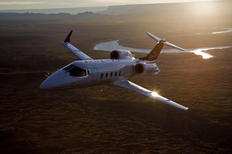 Private Jet in Flight — White, Dramatic