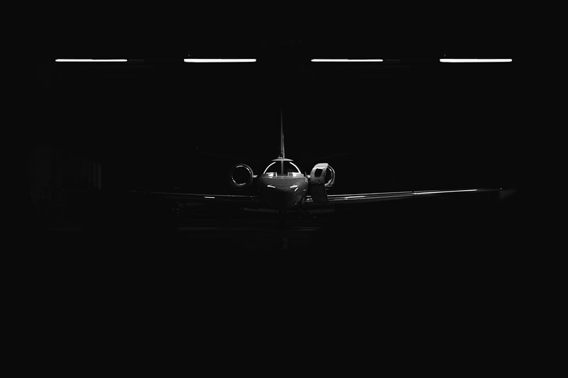 Private Jet in Hangar — Black