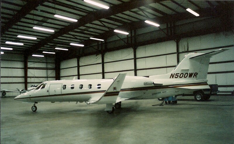 Private Jet in Hangar — White