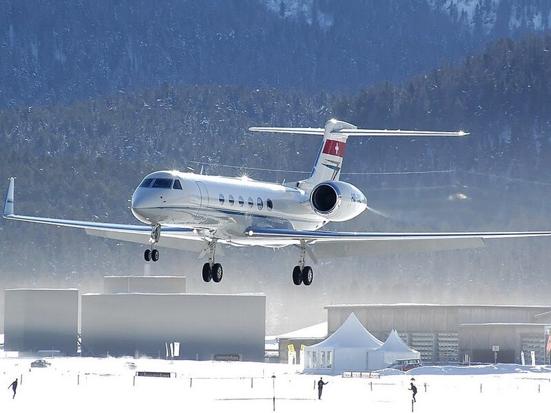 private jet landing in snow