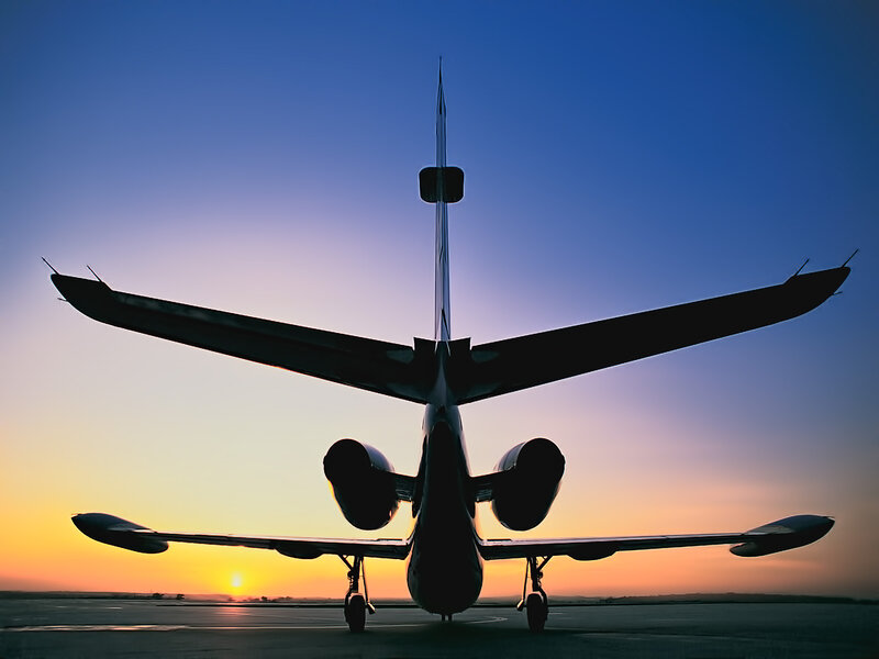 Private Jet on Runway — Blue