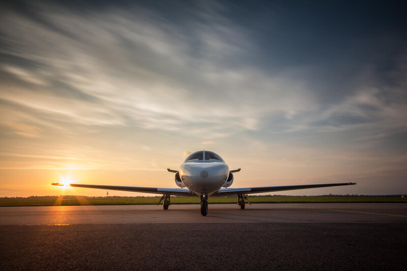 Private Jet on Runway — Orange, Serene
