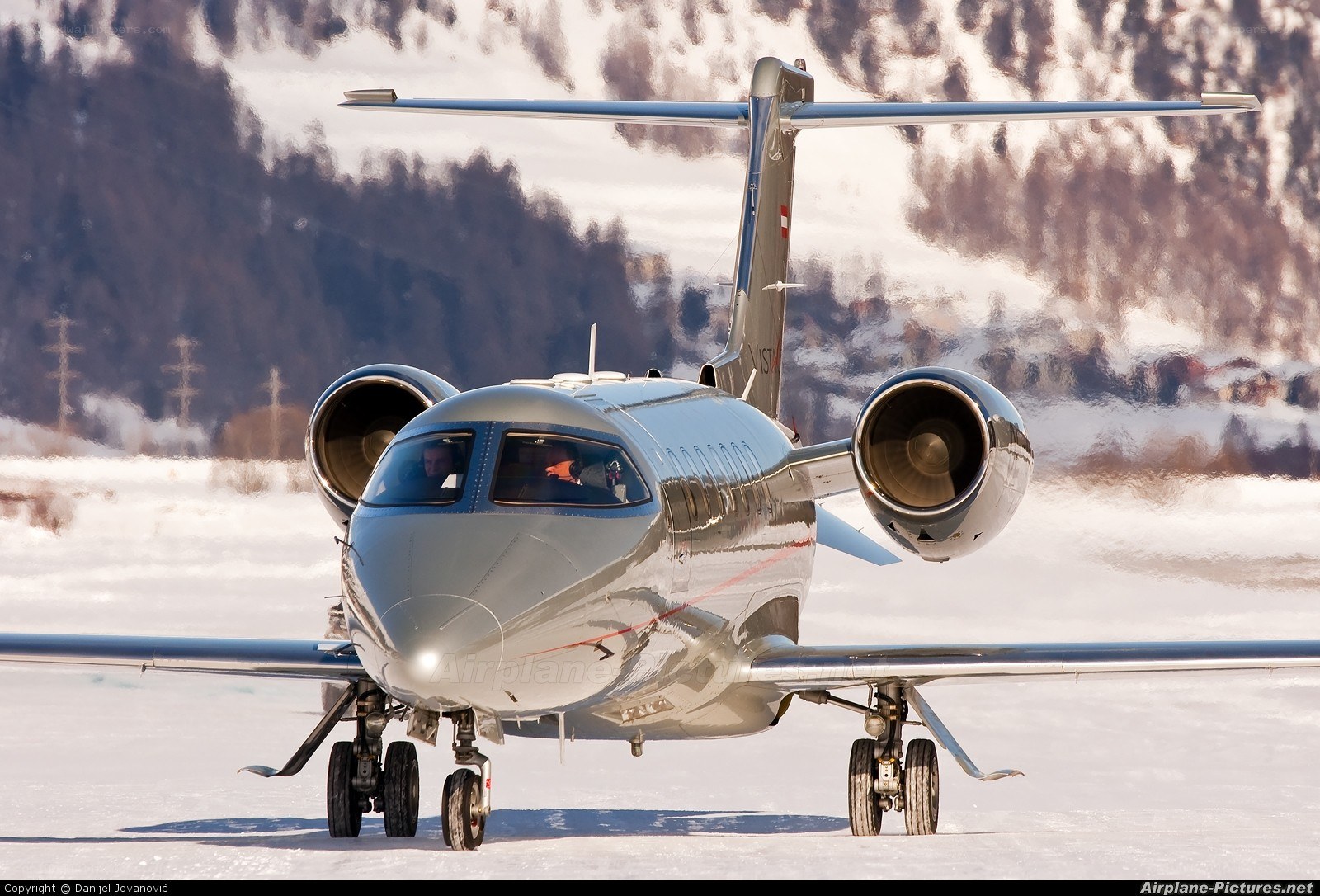private jet on snowy runway
